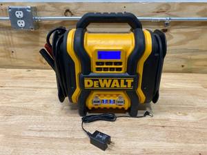lot 76 image: DEWALT 1600 Peak Amp Portable Car Jump Starter with 120 PSI Digital Air Compressor and 500-Watt Inverter