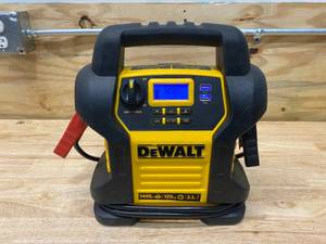 lot 77 image: DEWALT 1400 Peak Amp Portable Car Jump Starter with Digital Compressor