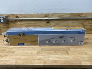 lot 114 image: HAMPTON BAY 4-Light Brushed Steel Wave Bar Track Lighting Fixture with Cylinder Glass Shades