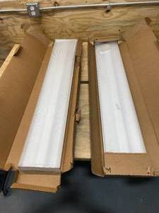 lot 116 image: LITHONIA LIGHTING Lot of 2- SB 2 32 120 GESB 4 ft. Wraparound Fluorescent Ceiling Fixtures