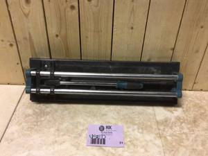 lot 31 image: 14 in. Ceramic and Porcelain Tile Cutter by ANVIL Customer Returns See Pictures