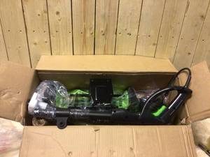 lot 51 image: 16 inch  12 Amp Corded Snow Thrower by Earthwise Customer Returns See Pictures