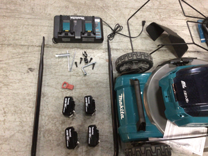 lot 108 image: 21 in. 18-Volt X2 (36-Volt) LXT Lithium-Ion Cordless Walk Behind Self Propelled Lawn Mower Kit with 4 Batteries (5.0 Ah) by Makita Customer Returns See Pictures