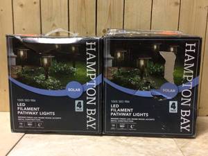 Hampton Bay 10 Lumens Solar 2-Tone Bronze and Warm Wood LED Landscape Pathway Light Set (4-Pack) Customer Returns See Pictures