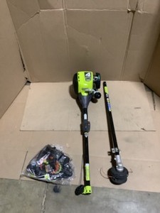 RYOBI 4-Cycle 30cc Attachment Capable Straight Shaft Gas Trimmer. See Pictures