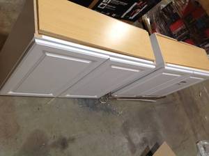 lot 21 image: Set of two Hampton Bay Hampton Satin White Raised Panel Stock Assembled Wall Kitchen Cabinet (36 in. x 30 in. x 12 in.) Customer Returns
