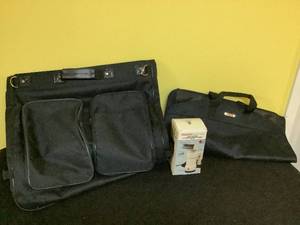 lot 76 image: Electric Clothes Steamer & 2 Garment Bags