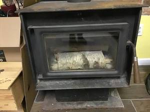 lot 104 image: Free Standing Wood Burning Fireplace