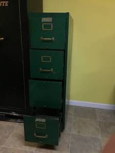 lot 105 image: Vintage 4 Drawer File Cabinet