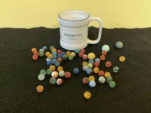 lot 153 image: Glass Marbles and Mug