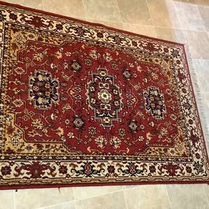 lot 139 image: Red Oriental Rug