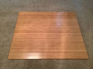 lot 203 image: Faux Wood Rolling Chair Mat