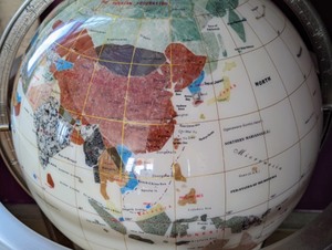 Rotating Stone Inlaid Globe and Stand