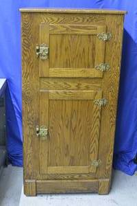 Antique tall solid oak ice chest with brass hardware