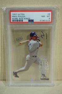 lot 16 image: 1997 Fleer Ultra Mike Piazza Home Run Kings #8 - PSA 8 NM-MT