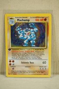 lot 21 image: Machamp 8102 Base Set Red Number Hologram 1st Edition Pokemon Card