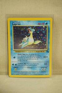 lot 25 image: Lapras 1062 Fossil Expansion Red Number Hologram Pokemon Card