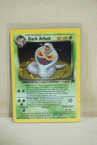 lot 32 image: Dark Arbok 282 Team Rocket Red Number Hologram Pokemon Card