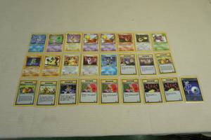 lot 37 image: Red Number Team Rocket Expansion Pokemon Cards