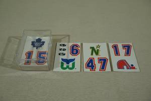 lot 134 image: Vintage Hockey Helmet Stickers - Whalers, North Stars, Nordiques