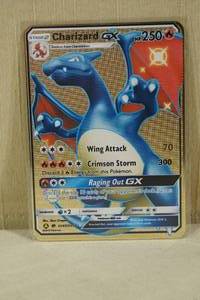 lot 145 image: Custom Metal Charizard GX Pokemon Card