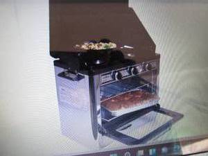 lot 20 image: Camp Chef 10,600 Btu Camp Stove wit...