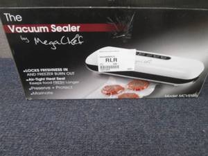 lot 31 image: MegaChef Home Vacuum Sealer and Foo...