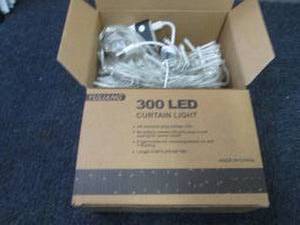 lot 62 image: 2 pks 300 ct Curtain Lights...