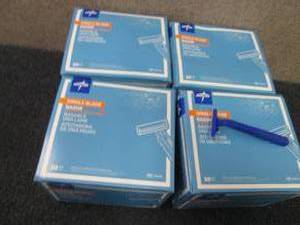 lot 216 image: 4- 50 pks Medline Single Blade Faci...