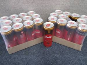 lot 243 image: 2-12 pks Coca Cola Caramel with Cof...
