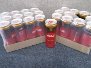 lot 247 image: 2-12 pks Coca Cola Caramel with Cof...