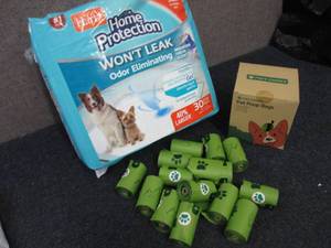 lot 321 image: 30 Hartz Dog Pads, Poop Bags...