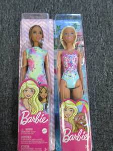 lot of 2 barbie dolls ...