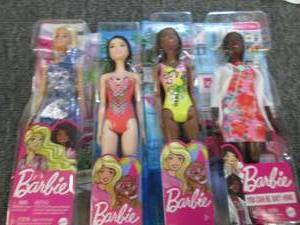 4 barbies ...