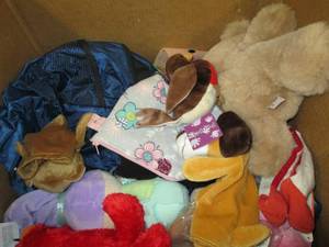 box of stuffed animals , socks and ...
