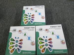 3 boxes of fidget toys ...
