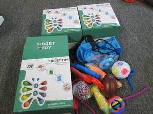 3 boxes of fidget toys ...