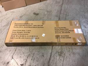 lot 63 image: Husky 48 in. Solid Wood Work Surface for Regular Duty Welded Steel Garage Storage System