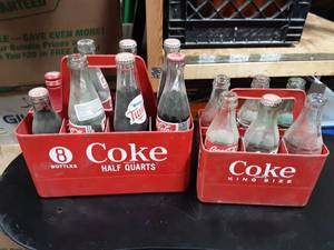 lot 11 image: Old Coca Cola Caddys With Bottles