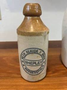 lot 32 image: 2 PRIMITIVE POTTERY CROCKS WITH 1 BEING AN ANTIQUE GINGER BEER BOTTLE&nbspSETH SENIOR & SONS Ltd. Shepley, Huddersfield