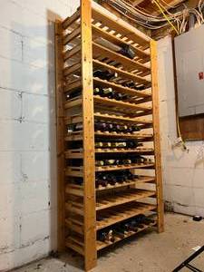 lot 57 image: Very Nice & Sturdy Large Wood Wine Rack Stored In The Cool Basement - All The Wine Bottles Are Included But We Have No Idea Whether They Are Still Good...  