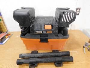 lot 85 image: RIDGID 4.5 Gallon 5.0-Peak HP ProPack WetDry Shop Vacuum with Fine Dust Filter, Expandable Hose and Accessories