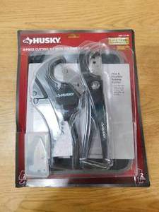lot 128 image: Husky 4-Piece PVC Cutting Kit with Foldable Pouch and Replacement Blades