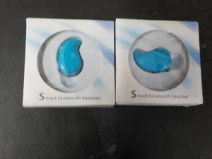 2 Blue Smart Bluetooth Headsets...
