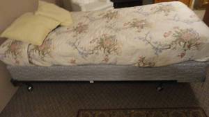lot 180 image: Twin Bed Frame With Free Mattress