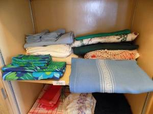 lot 266 image: Large Lot of Table Dollies, Place Mats, Blanket