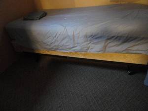 lot 206 image: Twin Bed Frame With Free Mattress