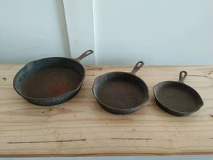 lot 178 image: Three Vintage Cast Iron Pans