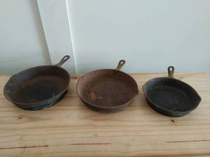 lot 180 image: Three Vintage Cast Iron Pans