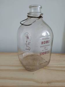 lot 146 image: Vintage One Gallon Milk Jug